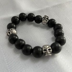 Black bead and silver skull bracelet